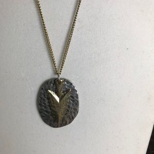 Arrowhead on hammered metal Necklace
